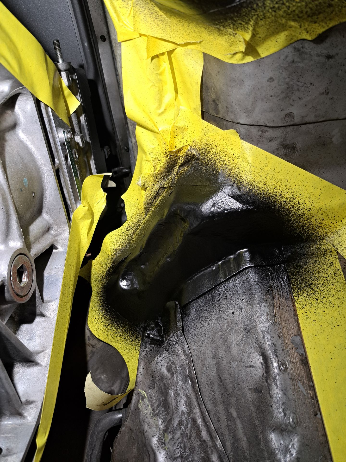 Coated modified tunnel area near the Honda S2000 firewall