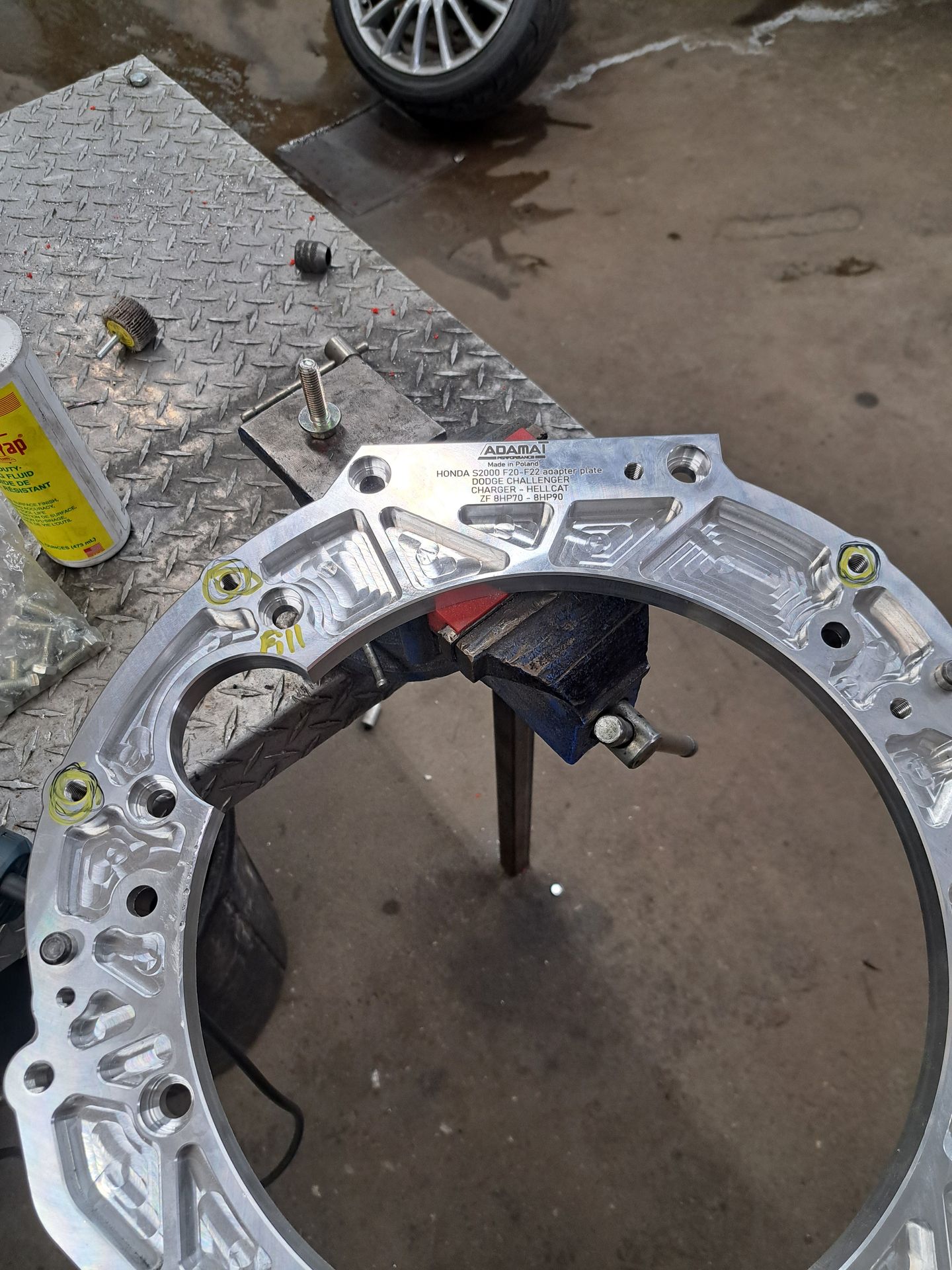 Honda S2000 F20 to Dodge ZF 8HP adapter plate on the workbench