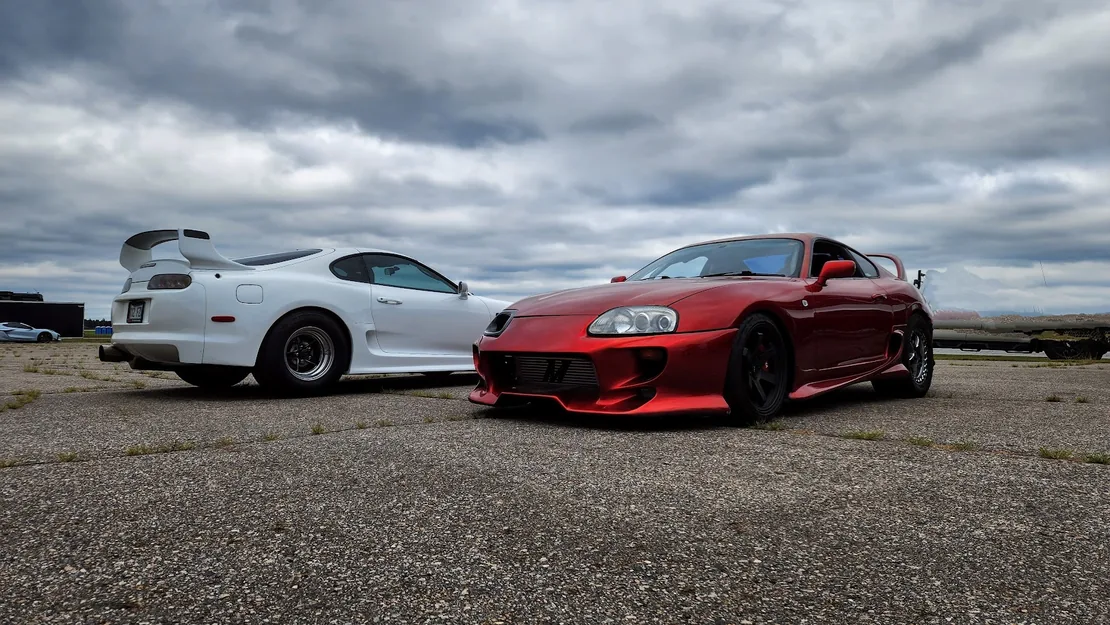 Two Toyota Supra MKIV cars